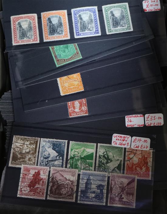 An accumulation of stamps on stockcards, including Hong Kong and Newfoundland